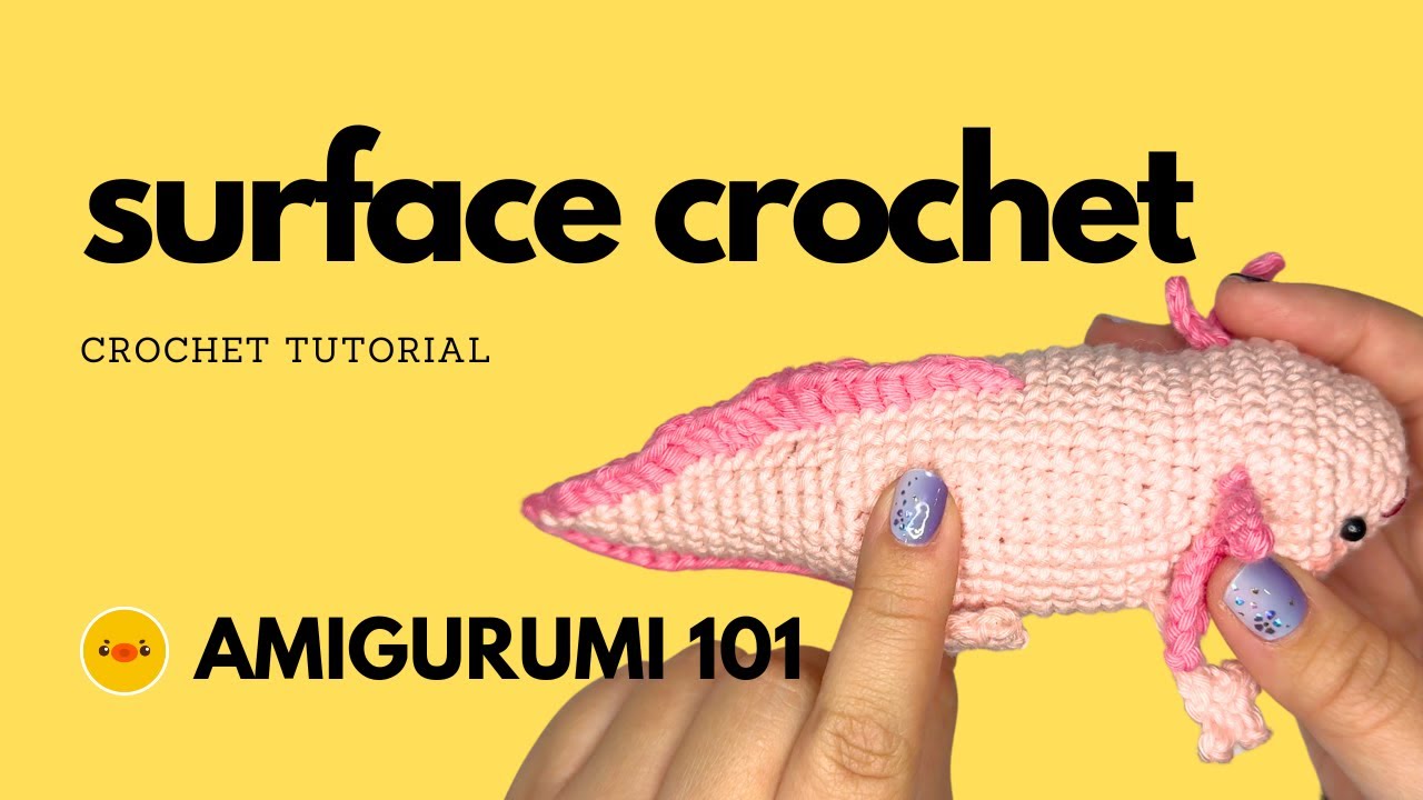 Surface crochet used to outline the features of a crochet bear