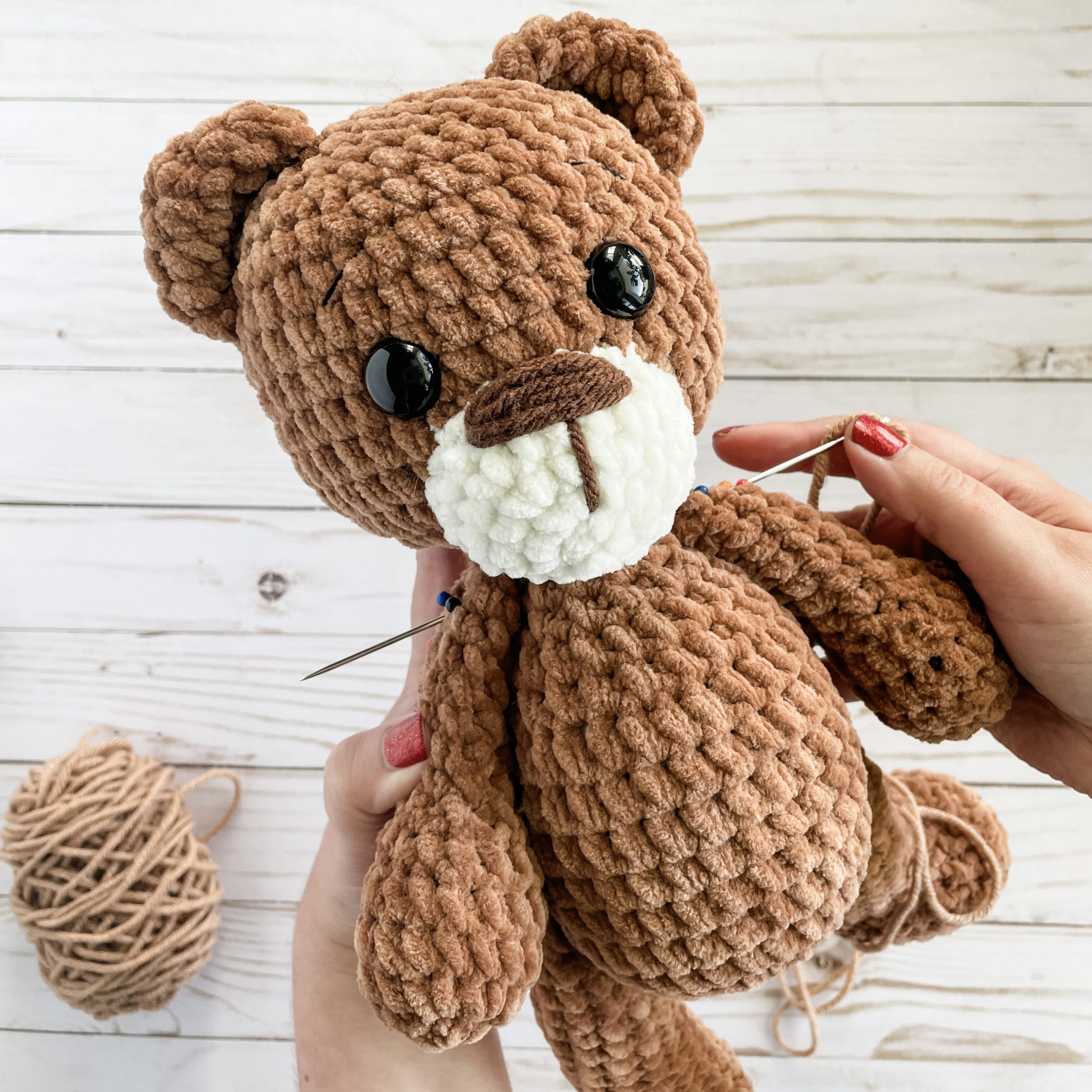 Demonstration of different techniques for attaching limbs to an amigurumi body